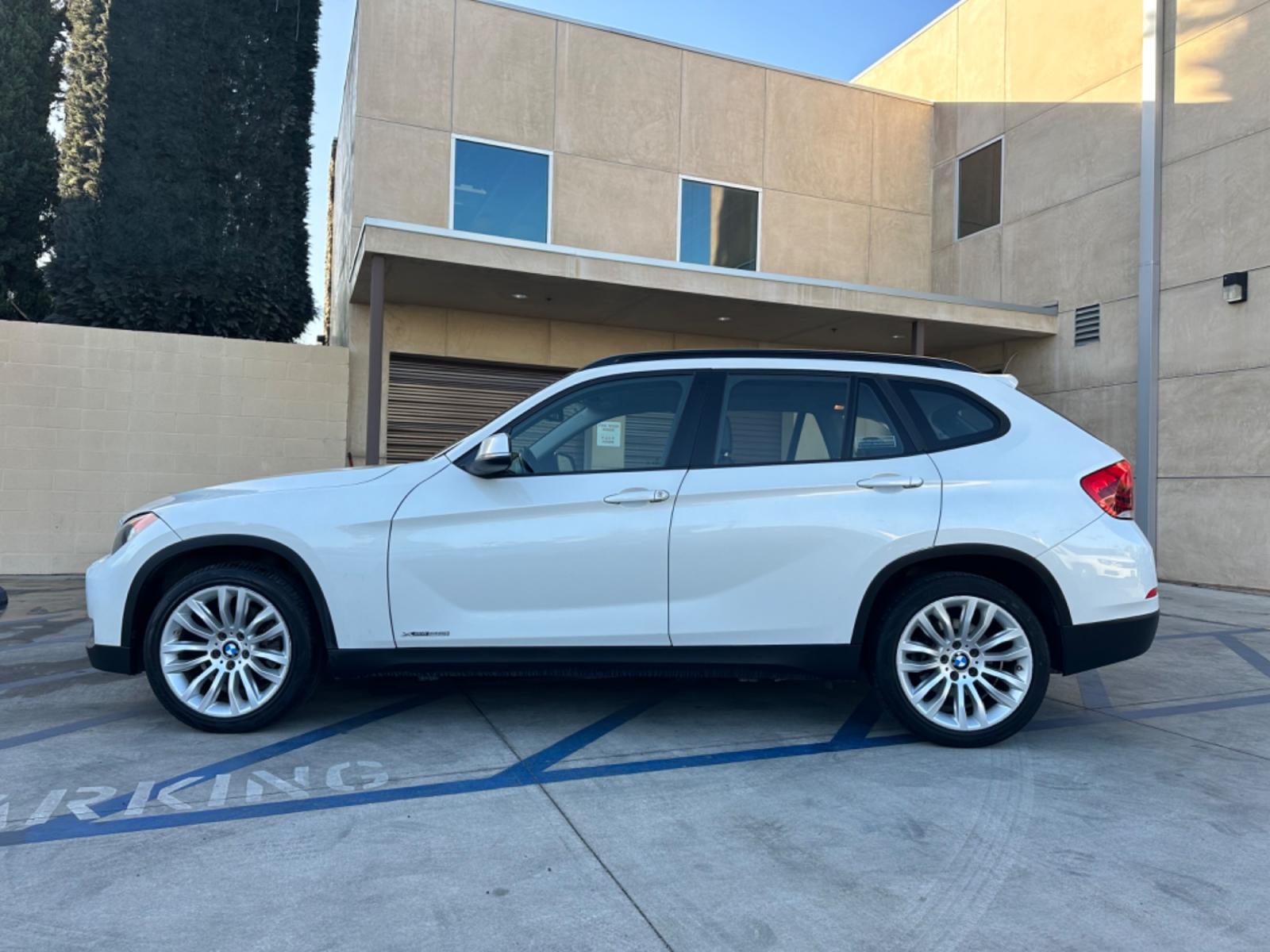 2014 WHITE /Black BMW X1 Leather (WBAVL1C56EV) with an 4 Cylinders engine, AUTOMATIC transmission, located at 30 S. Berkeley Avenue, Pasadena, CA, 91107, (626) 248-7567, 34.145447, -118.109398 - Don't let bad credit or financial setbacks hold you back from owning a luxury SUV like the 2014 BMW X1 xDrive28i. At our BHPH dealership, we're here to make the car-buying process as smooth and stress-free as possible. We invite you to visit our dealership in Pasadena, CA, to explore our inventory o - Photo #1